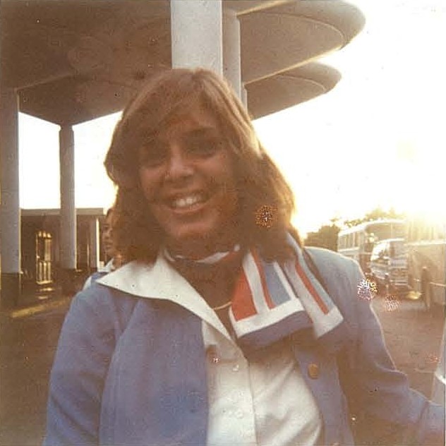 1970s Pan Am flight attendant outside airport terminal Guam